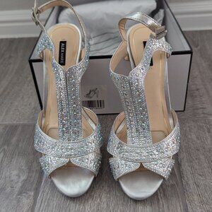 Holiday Silver strap 2inch high heels.